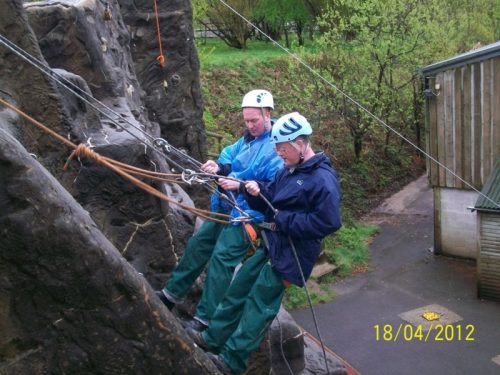 Paul Smart and Andrew Lindell abseiling at The Calvert Trust, Exmoor